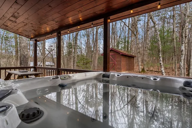 a view of swimming pool with seating space