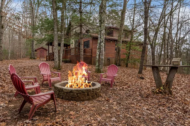 a view of a chairs and table in the patio