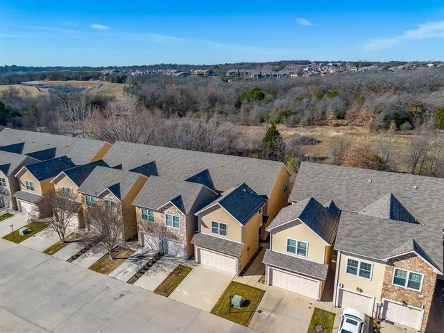 an aerial view of multiple house