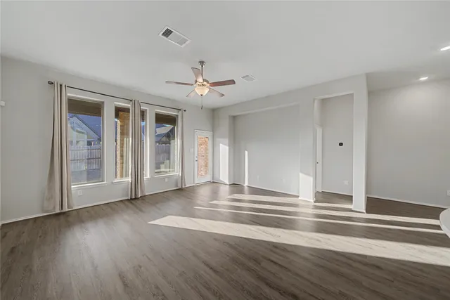 wooden floor and closet in a room