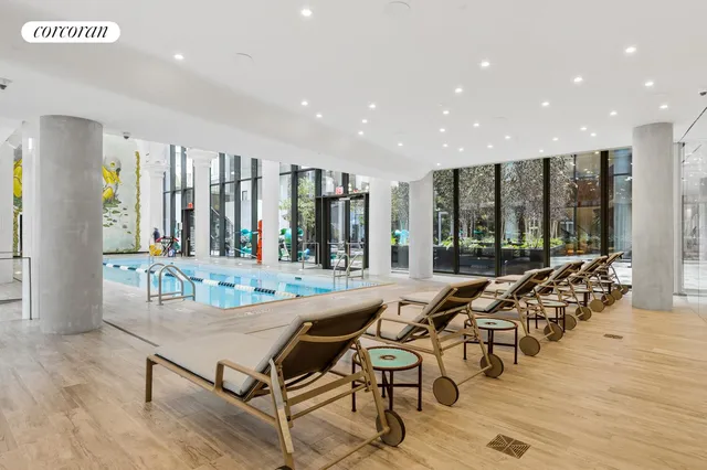 a view of a balcony with swimming pool