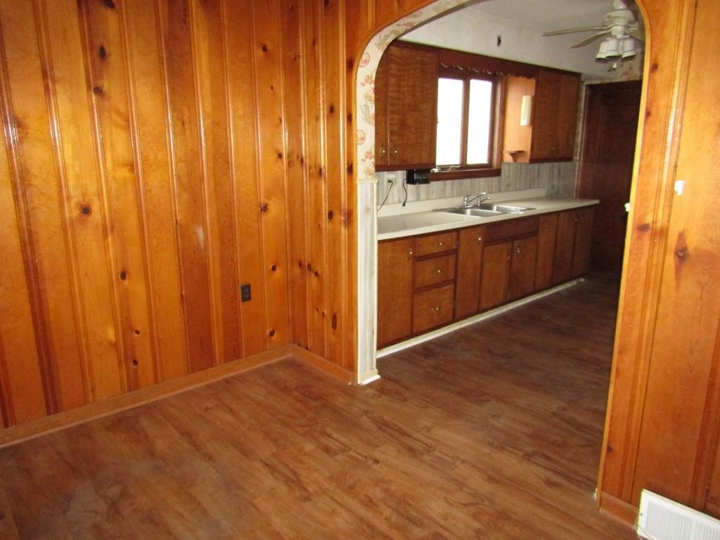 255 State Street Baden, PA 15005 - Photo 16 of 24 a view of a bathroom with a sink and mirror