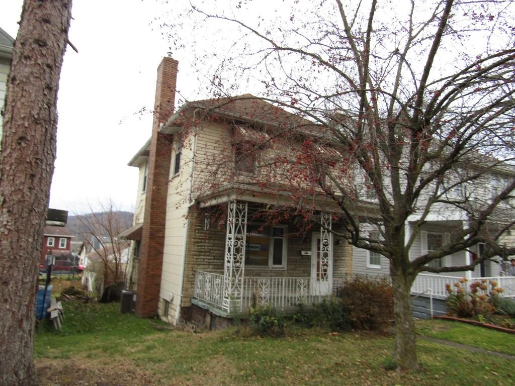 255 State Street Baden, PA 15005 - Photo 2 of 24 a front view of a house with garden