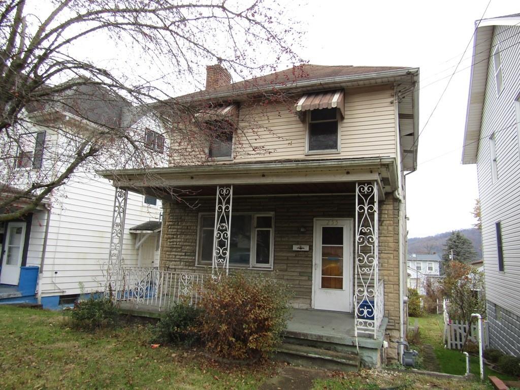 255 State Street Baden, PA 15005 - Photo 3 of 24 a front view of a house with garden