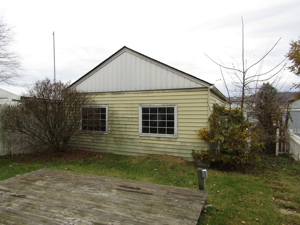 255 State Street Baden, PA 15005 - Photo 4 of 24 a view of a house next to a yard