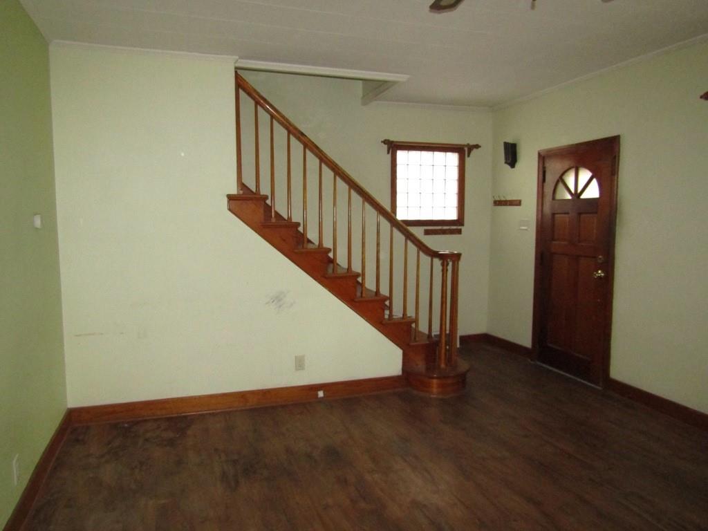 255 State Street Baden, PA 15005 - Photo 8 of 24 a view of an entryway with wooden floor and stairs