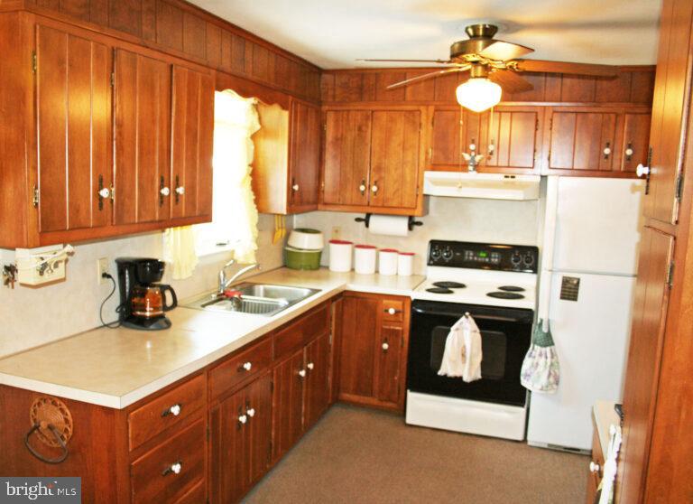 2049 Robin Drive Manheim, PA 17545 - Photo 11 of 25 a kitchen with a sink cabinets and window