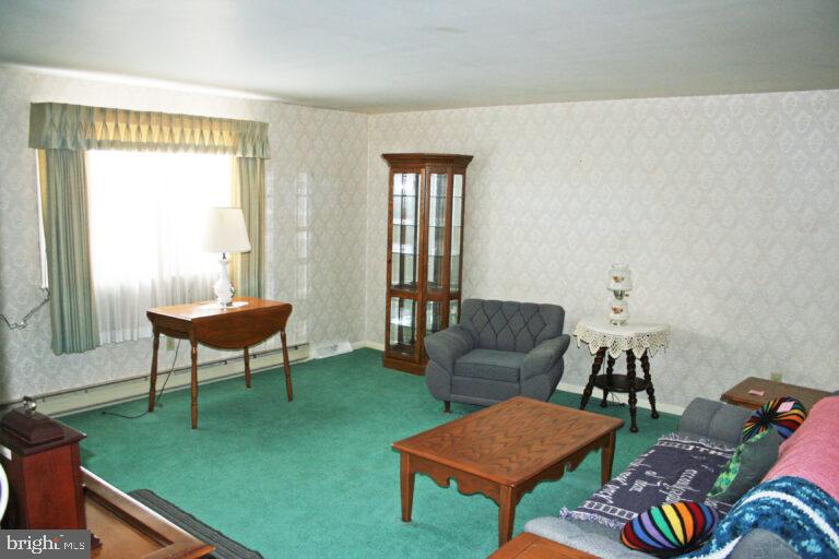 2049 Robin Drive Manheim, PA 17545 - Photo 12 of 25 a living room with furniture and a window