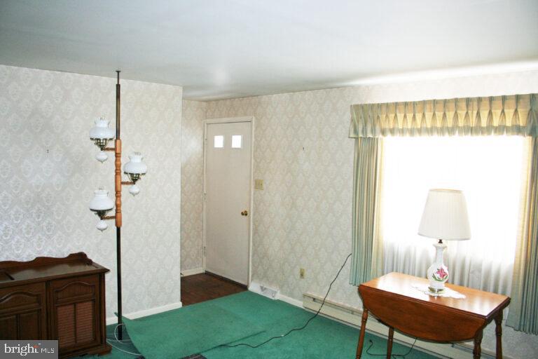 2049 Robin Drive Manheim, PA 17545 - Photo 13 of 25 a bedroom with a bed and a table in it