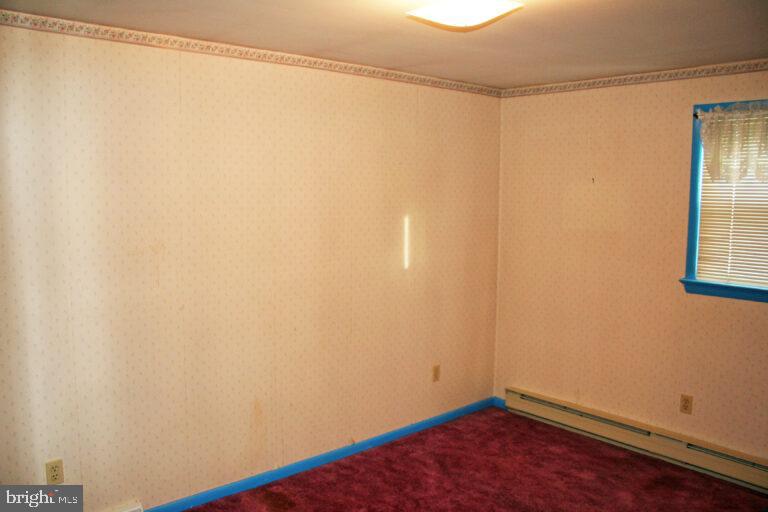 2049 Robin Drive Manheim, PA 17545 - Photo 16 of 25 a view of a small room with wooden floor and a window