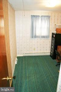 2049 Robin Drive Manheim, PA 17545 - Photo 17 of 25 a view of a room with a window and a flat screen tv