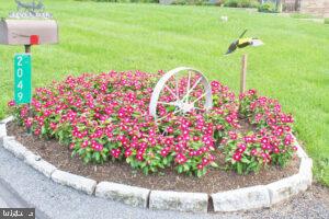 2049 Robin Drive Manheim, PA 17545 - Photo 19 of 25 a front view of a house with a yard and flowers