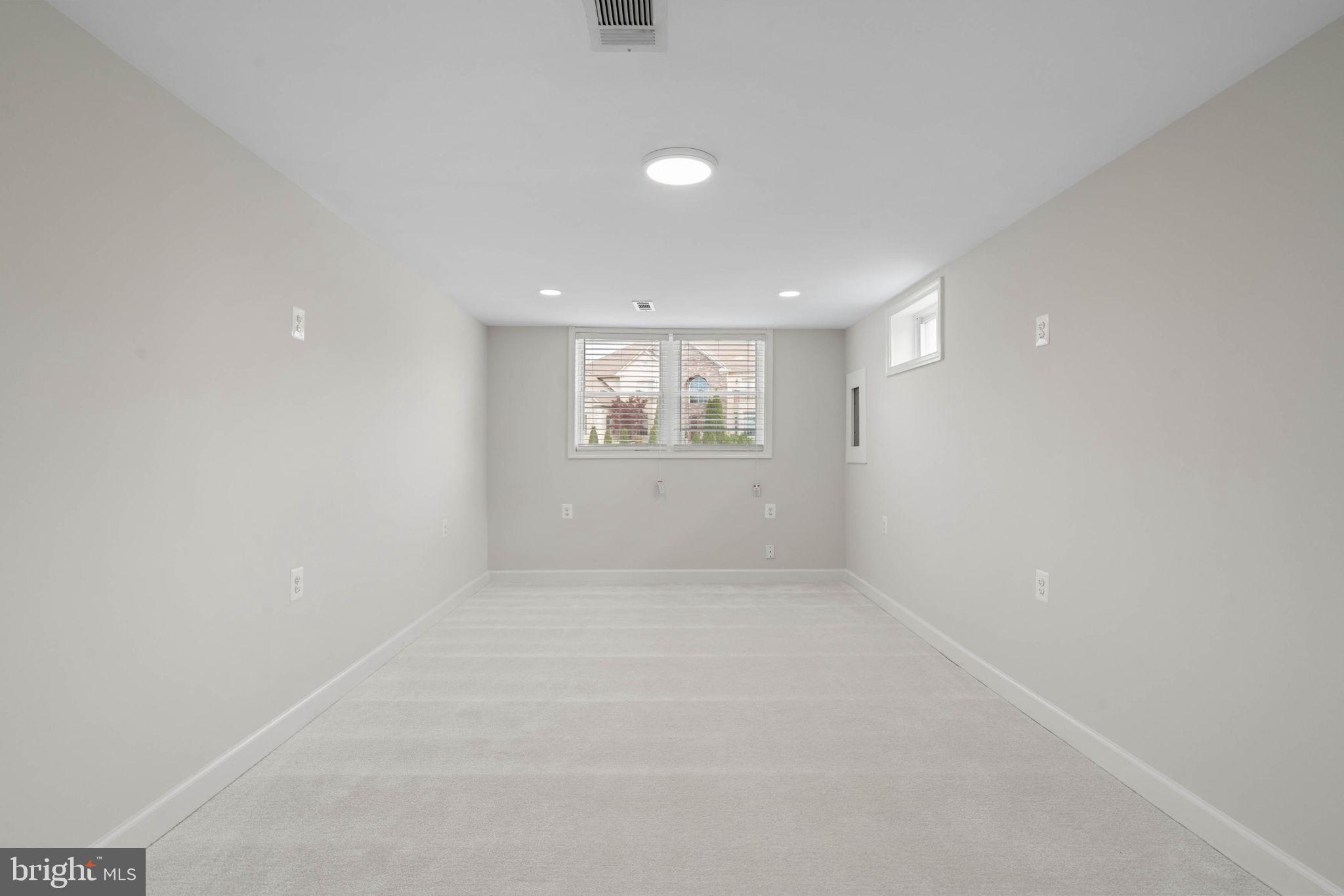 6607 Edsall Road Springfield, VA 22151 - Photo 33 of 47 a view of an empty room with a window