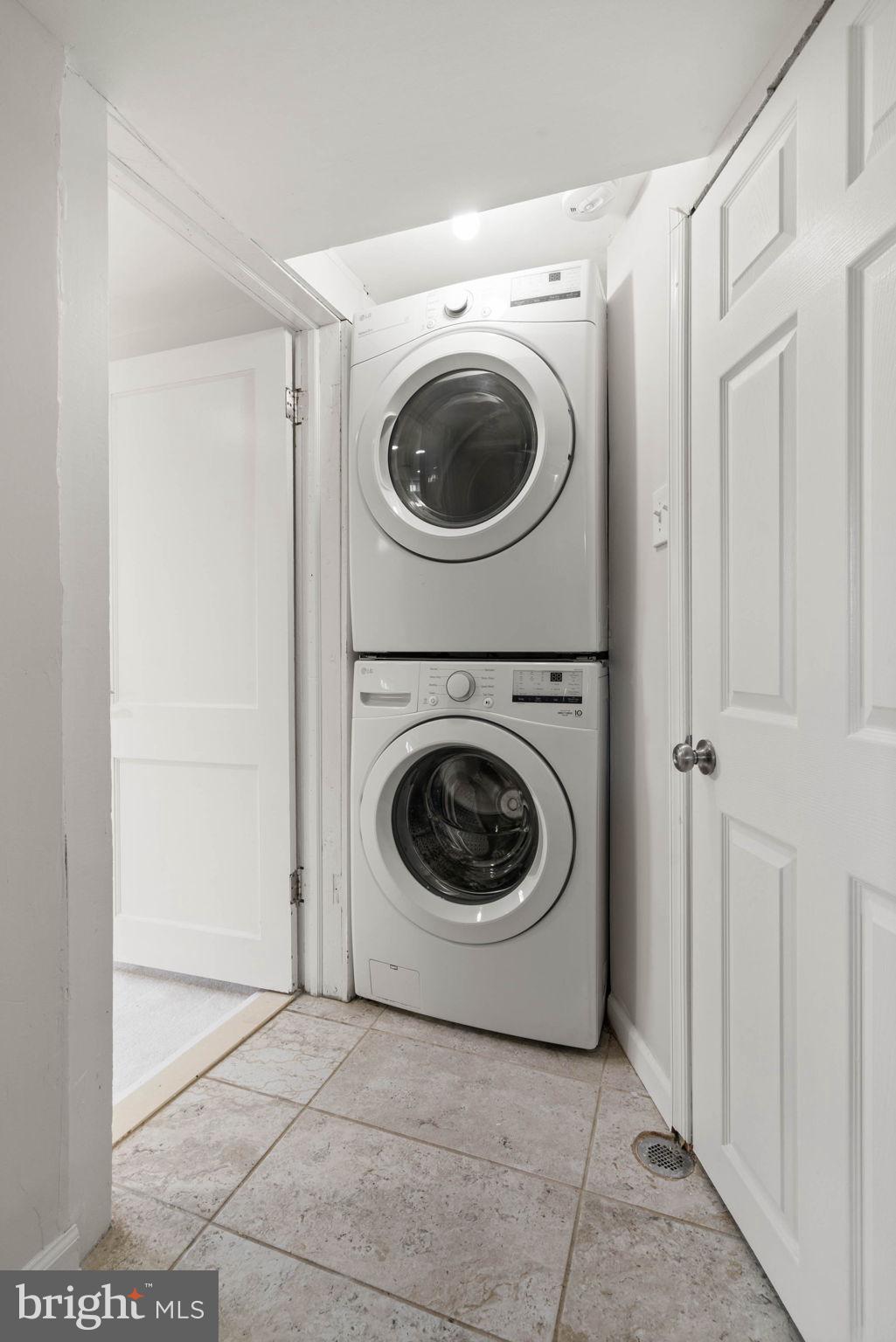 6607 Edsall Road Springfield, VA 22151 - Photo 35 of 47 a utility room with dryer and washer