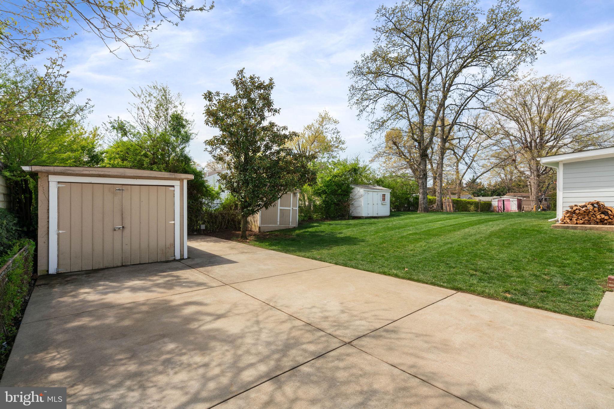 6607 Edsall Road Springfield, VA 22151 - Photo 40 of 47 a view of a house with a yard and tree