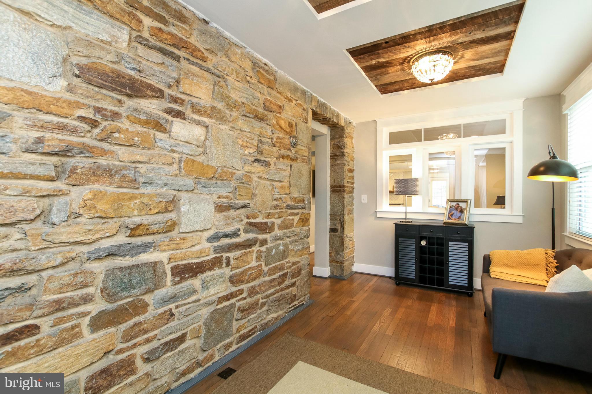 829 Kingston Road Baltimore, MD 21212 - Photo 1 of 30 a living room with furniture and a fireplace