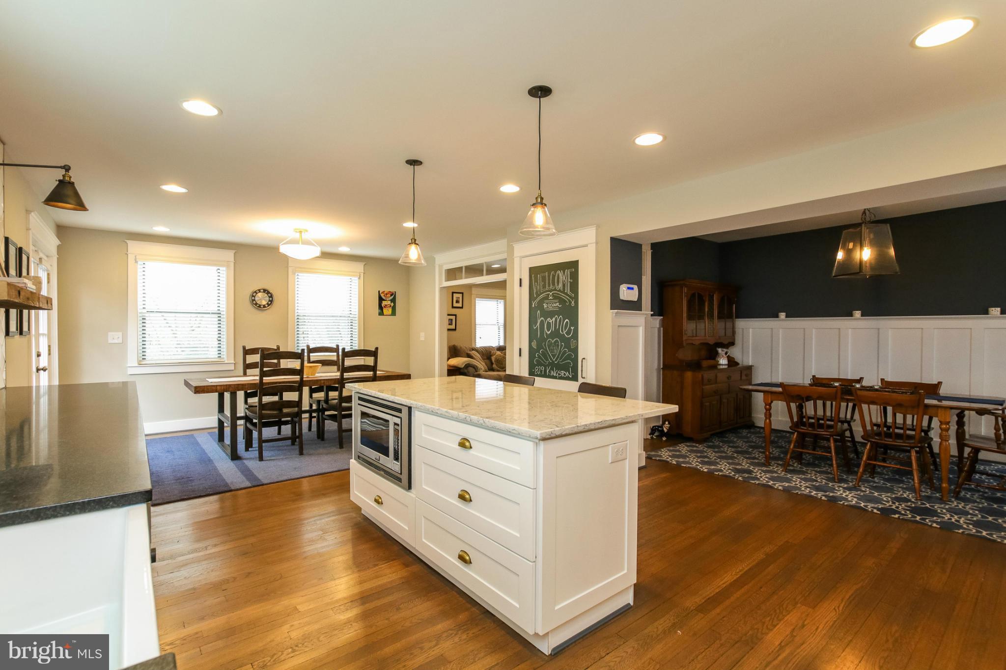 829 Kingston Road Baltimore, MD 21212 - Photo 12 of 30 a kitchen with lots of counter top space and dining table