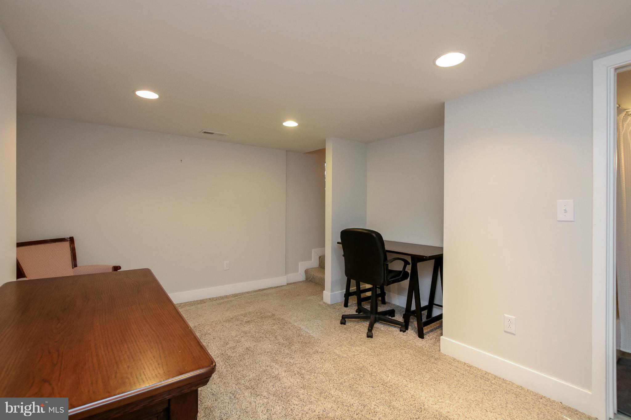 829 Kingston Road Baltimore, MD 21212 - Photo 27 of 30 a room with furniture and a piano