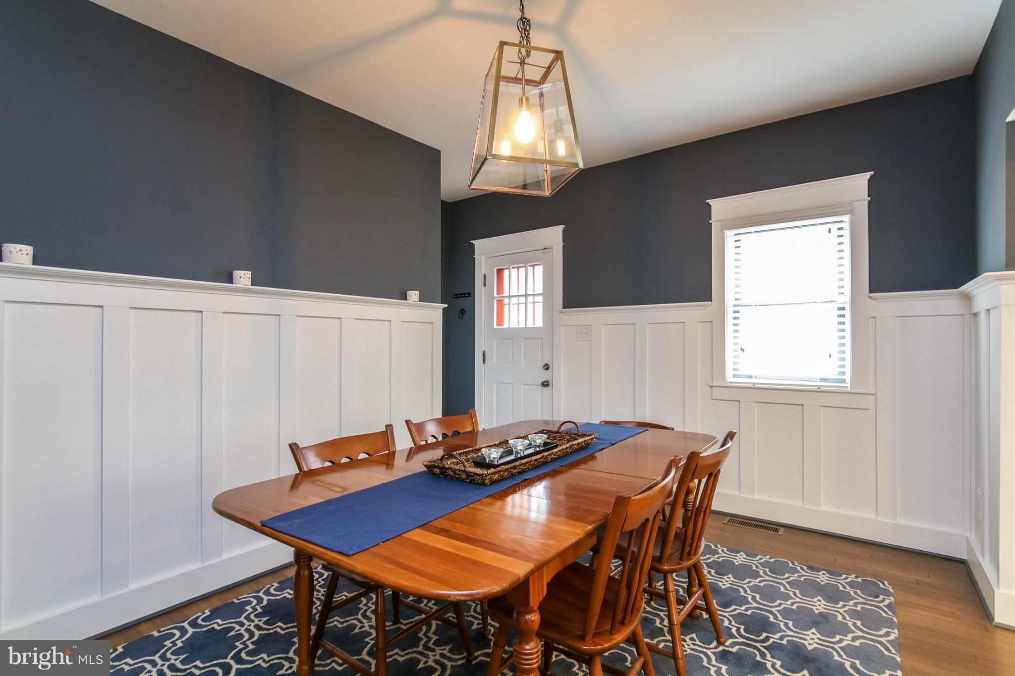 829 Kingston Road Baltimore, MD 21212 - Photo 9 of 30 a view of a dining room with furniture