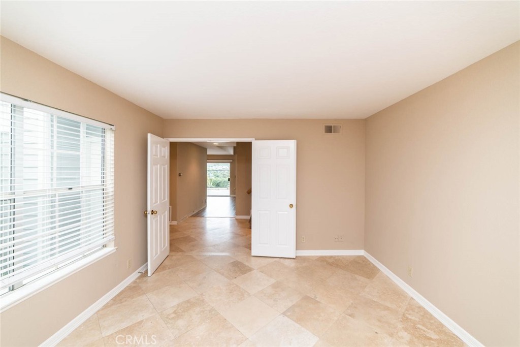 25 Parkman Road East Laguna Niguel, CA 92677 - Photo 2 of 36 a view of an empty room with a window