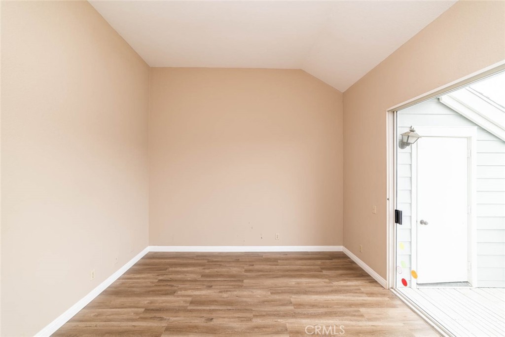 25 Parkman Road East Laguna Niguel, CA 92677 - Photo 22 of 36 a view of an empty room with wooden floor