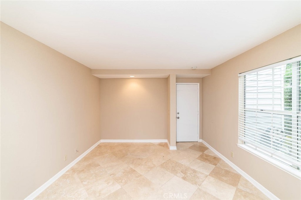 25 Parkman Road East Laguna Niguel, CA 92677 - Photo 3 of 36 a view of an empty room and a window