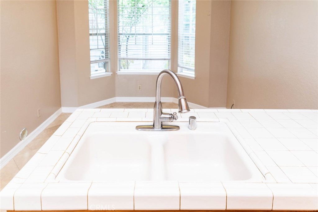 25 Parkman Road East Laguna Niguel, CA 92677 - Photo 35 of 36 a close view of a sink and tap