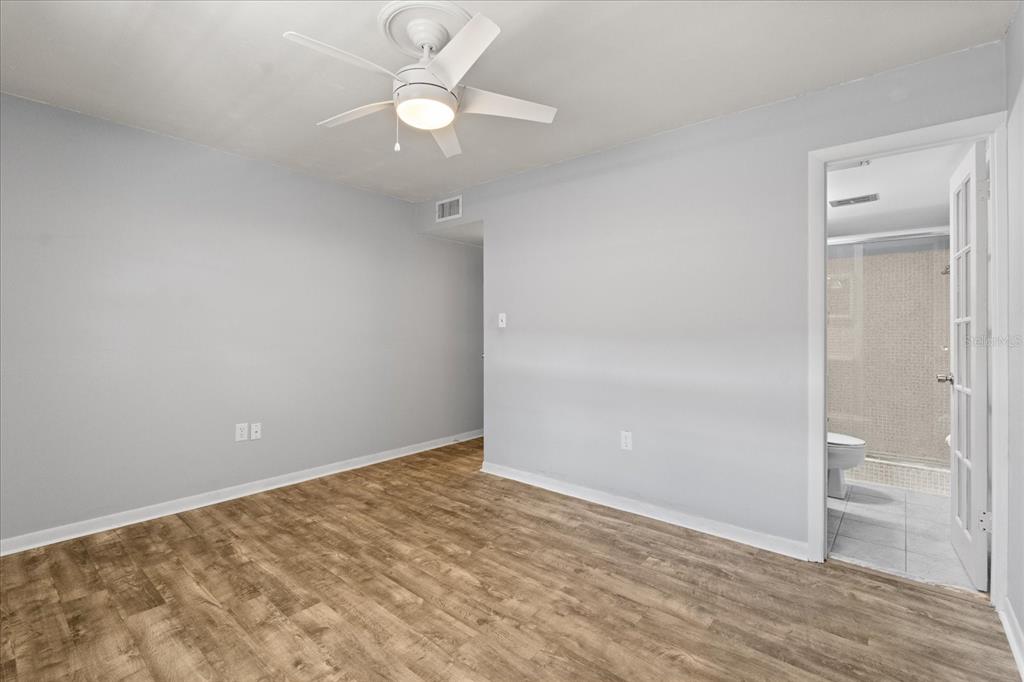 2500 Lee Road, Unit 208 Winter Park, FL 32789 - Photo 15 of 49 wooden floor in an empty room