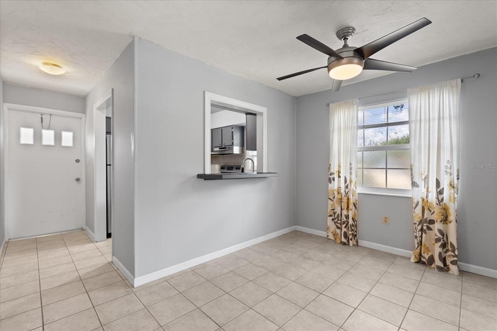 2500 Lee Road, Unit 208 Winter Park, FL 32789 - Photo 9 of 49 an empty room with windows and fan