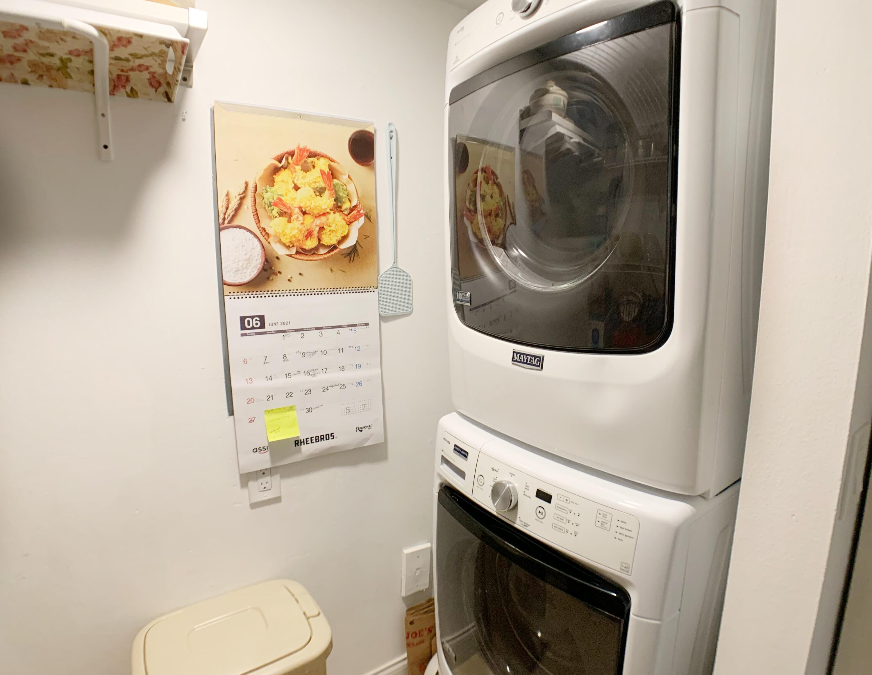 5015 Wiles Road, Unit 206 Coconut Creek, FL 33073 - Photo 29 of 32 a bathroom with a toilet and a sink