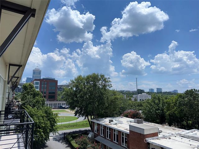 a view of a yard in front of a house