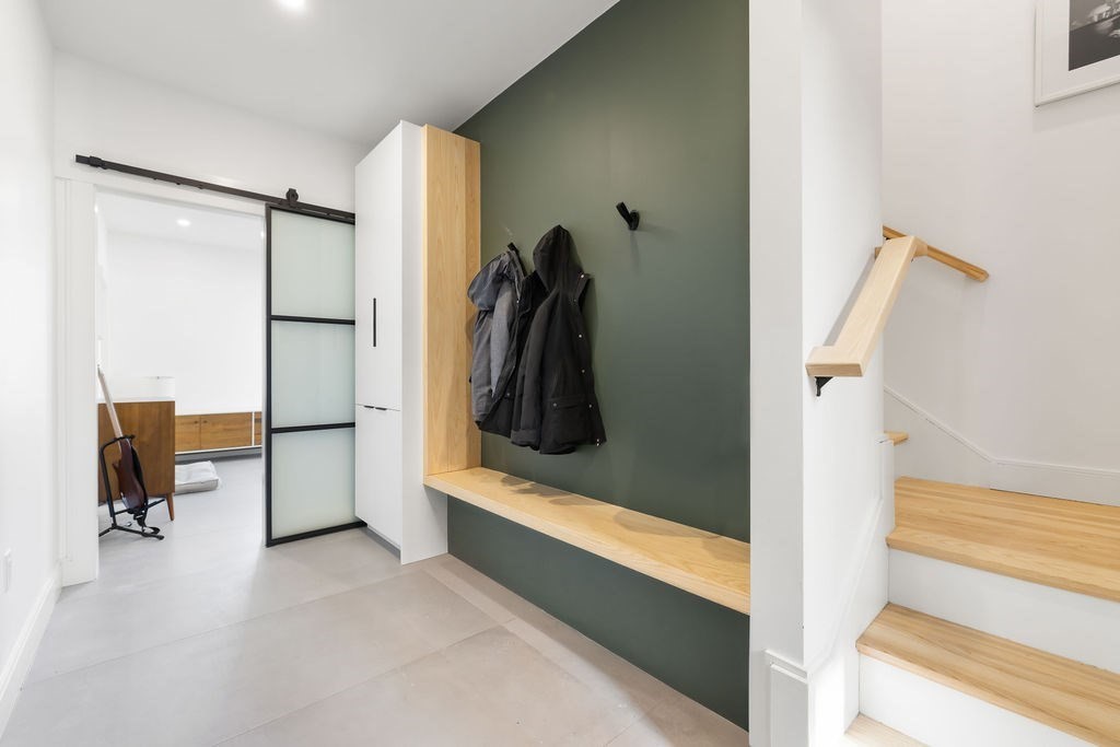 31 Hall Street, Unit 2 Waltham, MA 02453 - Photo 17 of 23 a view of walk in closet with clothes and shoes