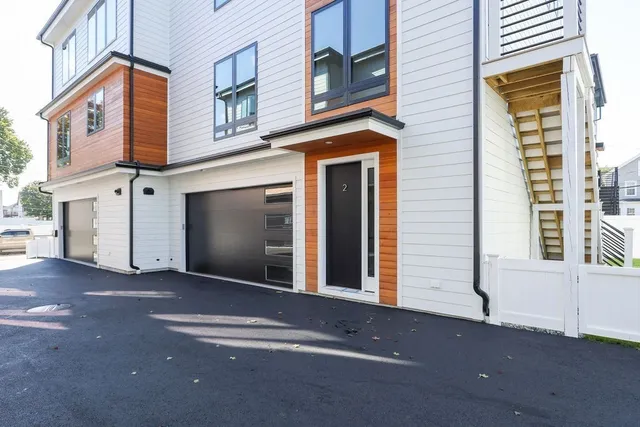 a view of a house with a street