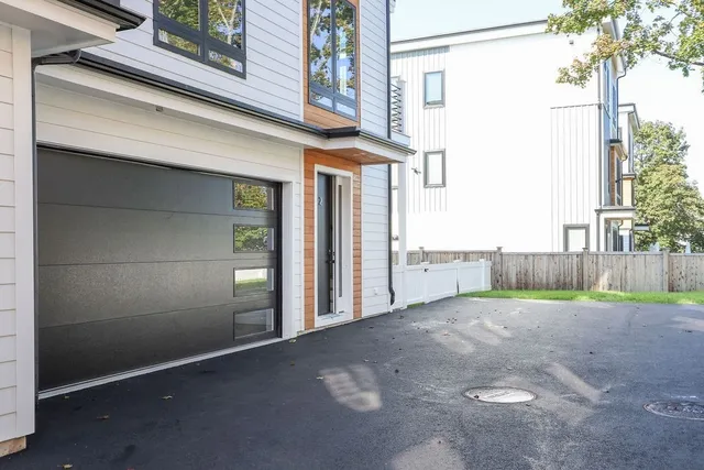 a view of a backyard of the house
