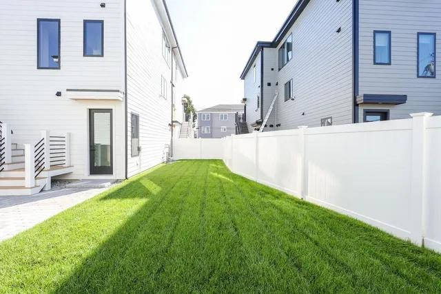 a bathroom with a sink and a yard