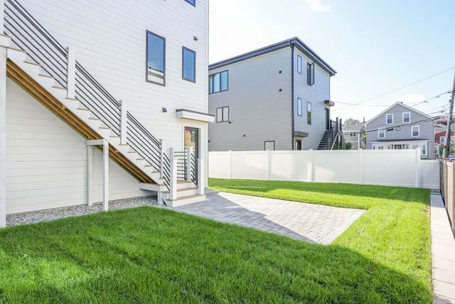 a view of a back yard of the house
