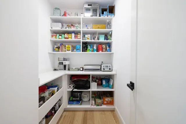 a room with storage and utility