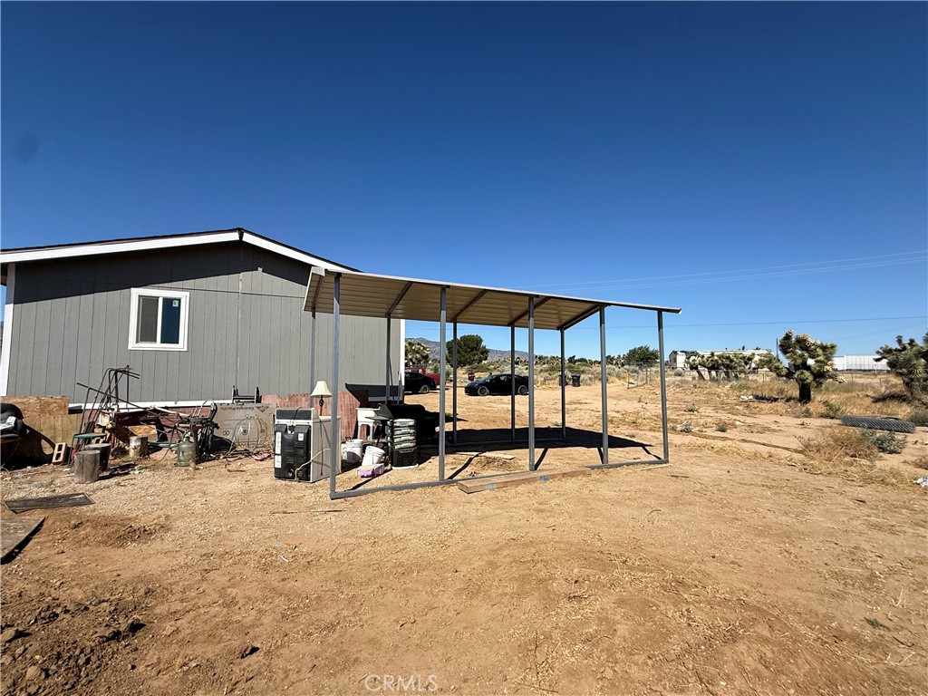 9589 Paramount Road Phelan, CA 92371 - Photo 7 of 29 a view of a terrace with sitting area
