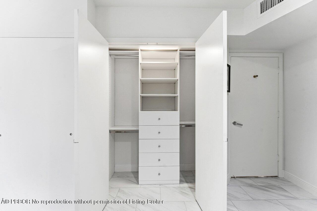 44 Cocoanut Row, Unit 120B Palm Beach, FL 33480 - Photo 21 of 42 a view of closet area
