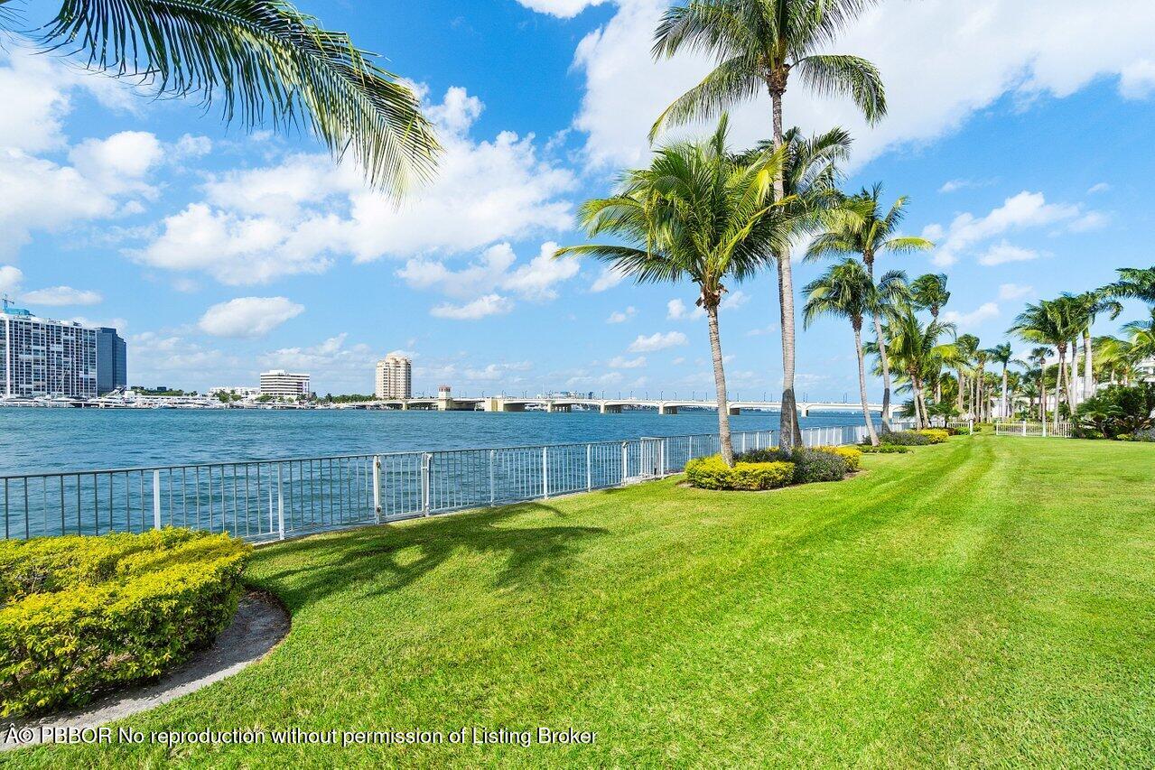 44 Cocoanut Row, Unit 120B Palm Beach, FL 33480 - Photo 30 of 42 a view of a garden with a fountain