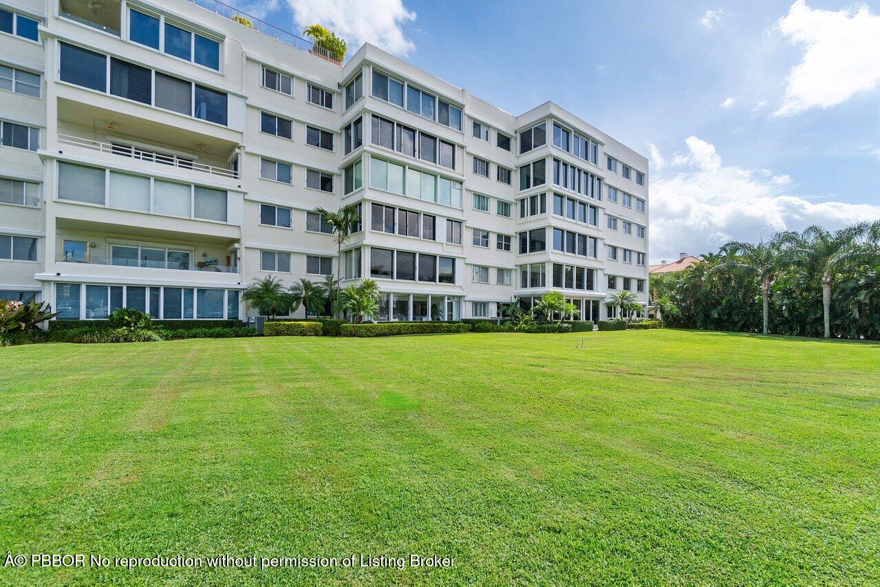 44 Cocoanut Row, Unit 120B Palm Beach, FL 33480 - Photo 32 of 42 a view of building with yard
