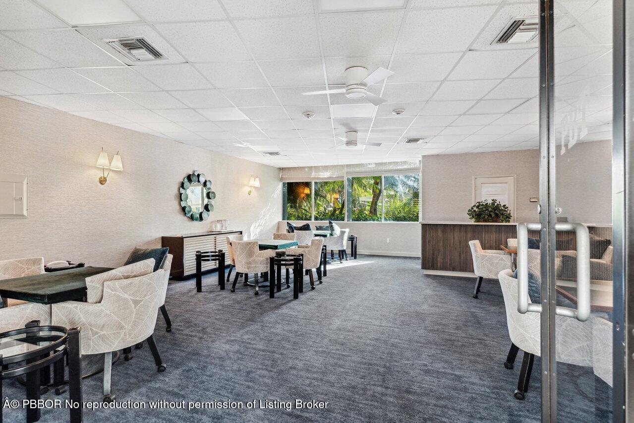 44 Cocoanut Row, Unit 120B Palm Beach, FL 33480 - Photo 36 of 42 a view of a dining room with furniture window and outside view
