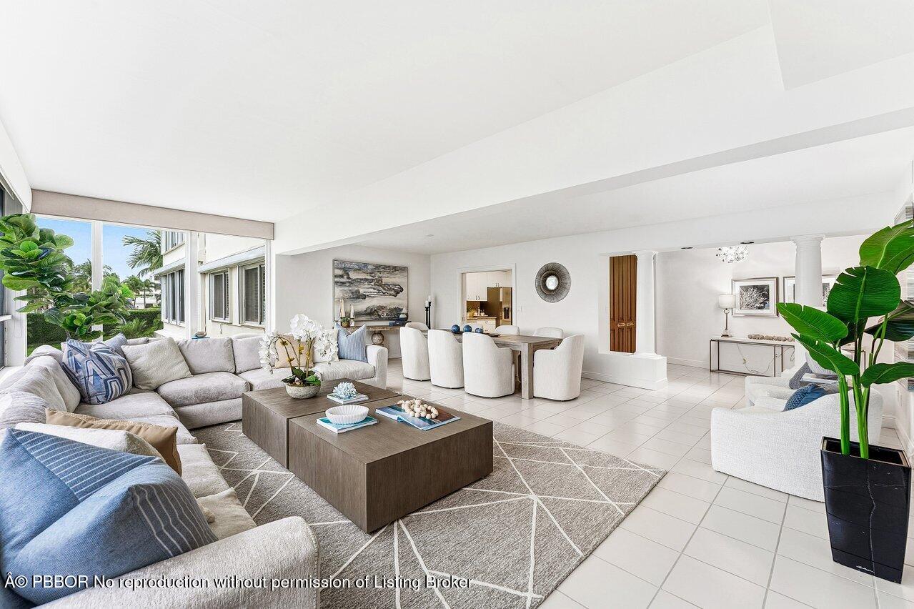 44 Cocoanut Row, Unit 120B Palm Beach, FL 33480 - Photo 7 of 42 a living room with furniture and a potted plant