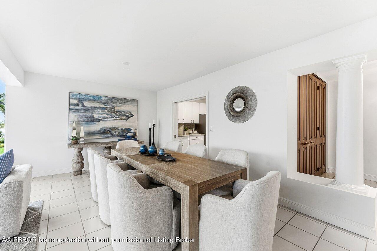 44 Cocoanut Row, Unit 120B Palm Beach, FL 33480 - Photo 8 of 42 a living room with furniture and a window