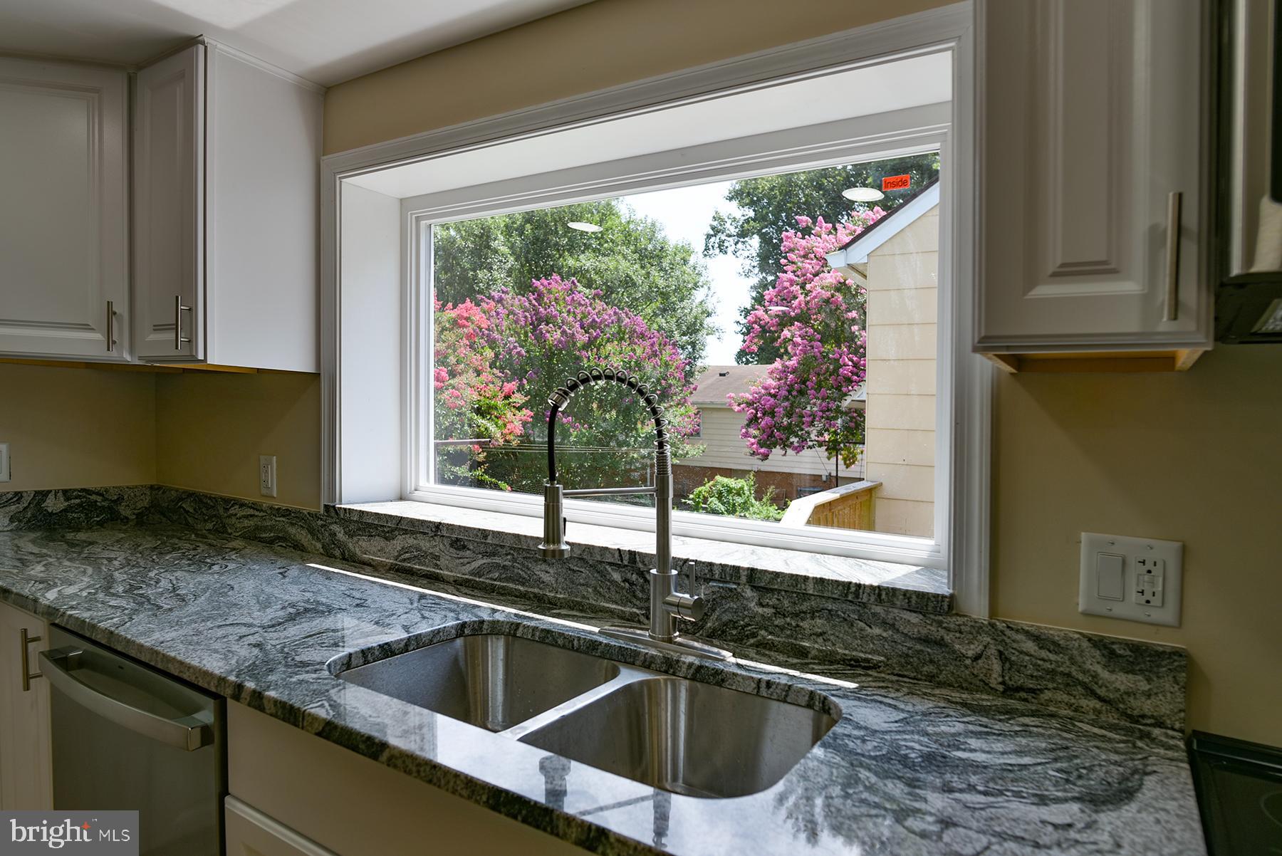 70 Nottingham Road Hagerstown, MD 21740 - Photo 12 of 39 a kitchen with a sink and large window