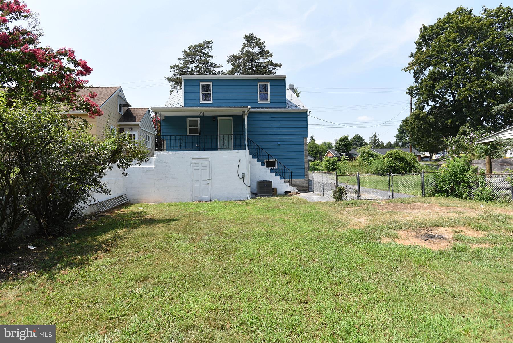 70 Nottingham Road Hagerstown, MD 21740 - Photo 5 of 39 a view of a house with a yard