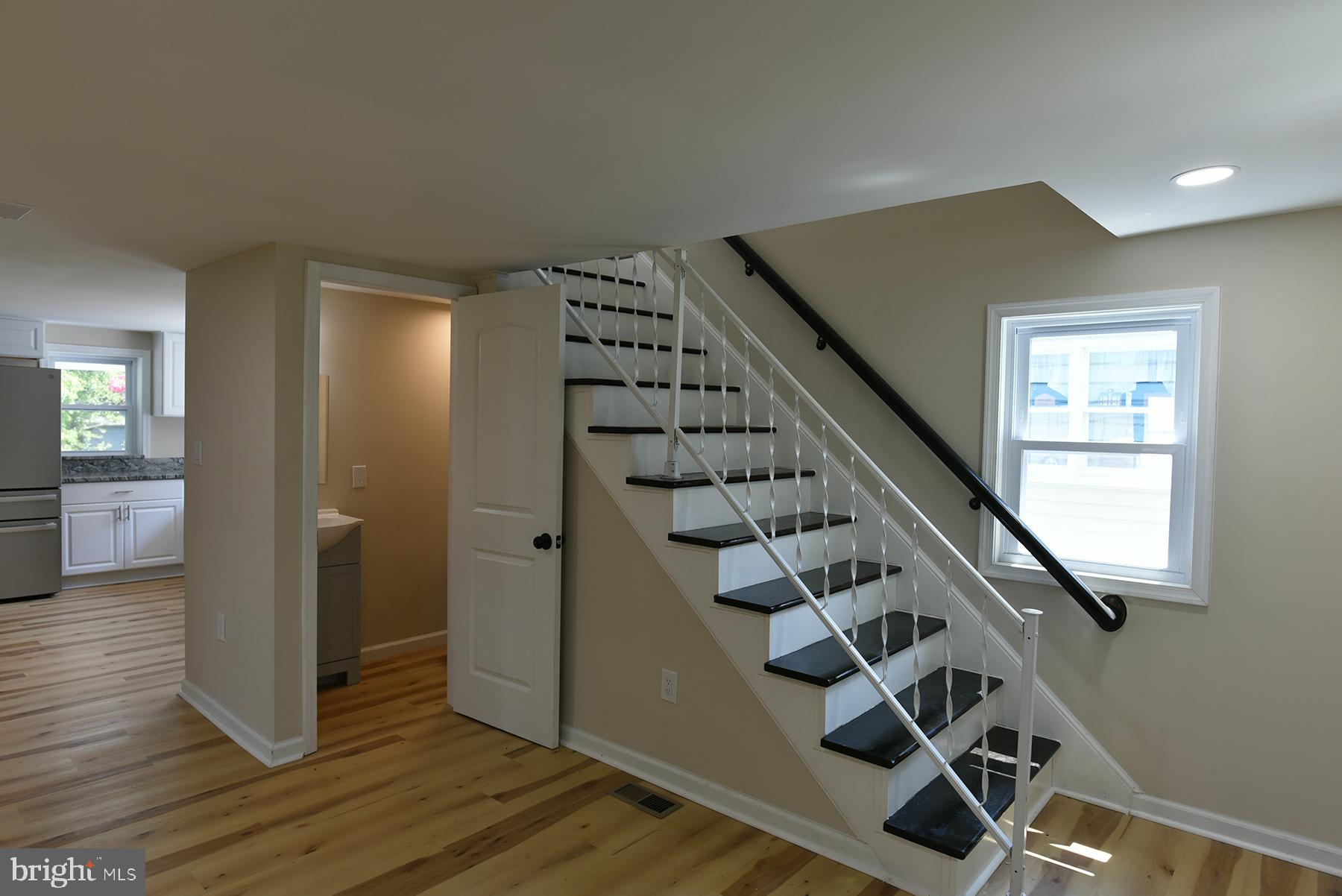 70 Nottingham Road Hagerstown, MD 21740 - Photo 9 of 39 a view of entryway with wooden floor and stairs