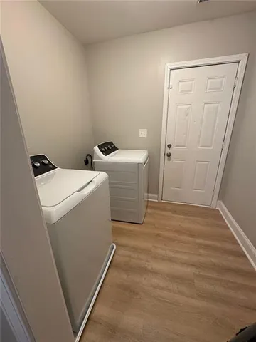 a view of utility room with dryer and washer