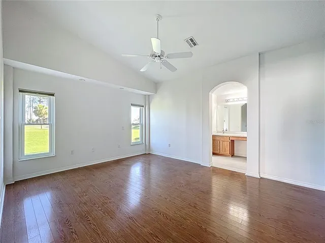 a view of an empty room with a balcony