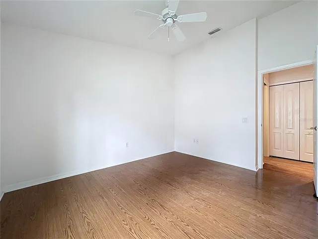an aerial view of residential houses with outdoor space and river